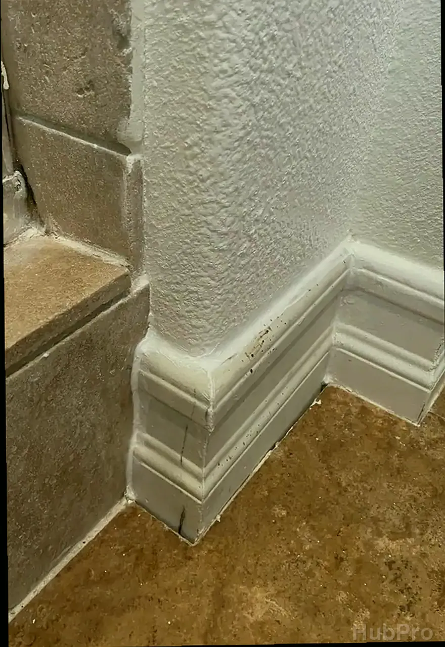 Professional drywall installers in Fullerton CA preparing drywall for paint
