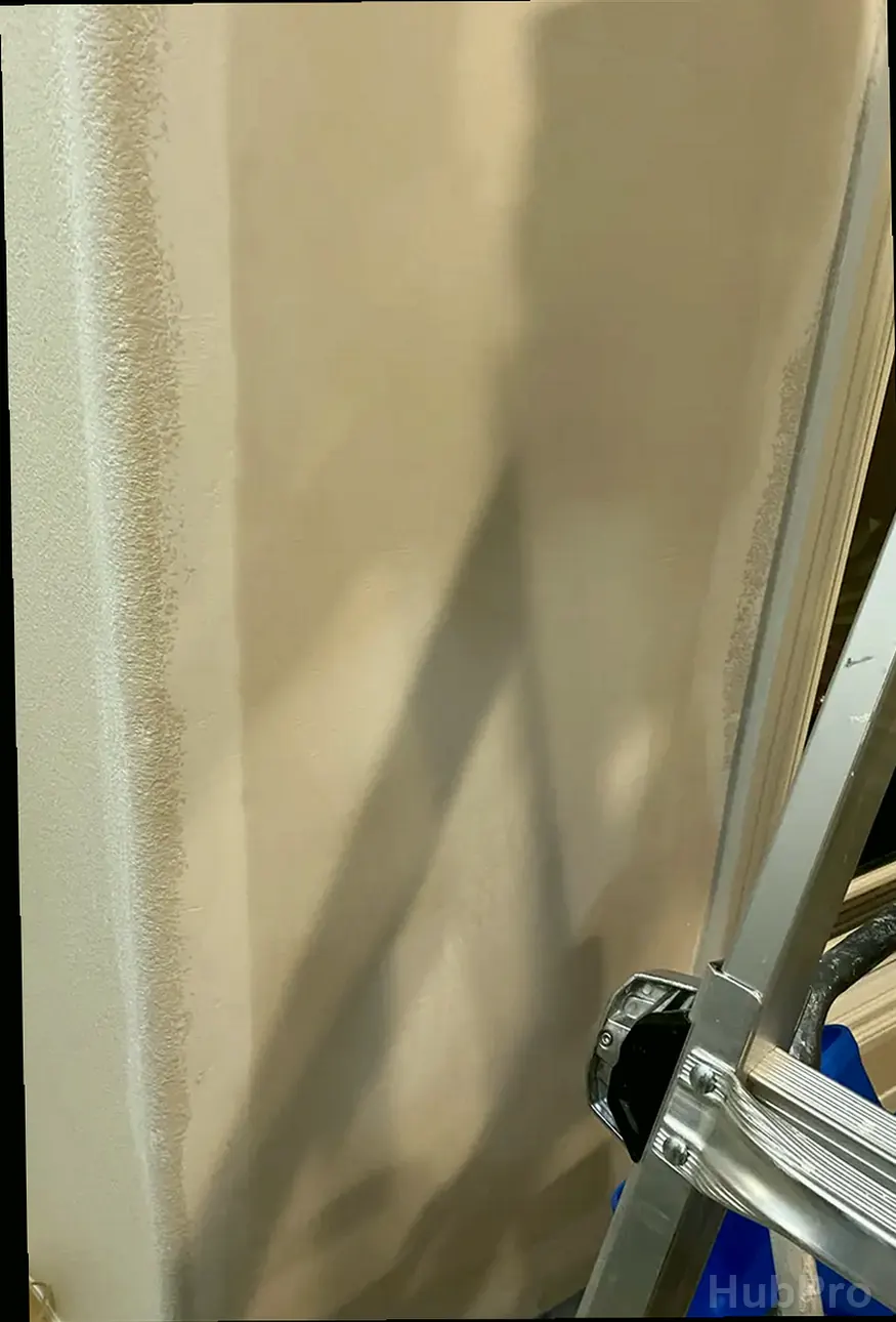 Wall hole repair service in Huntington Beach CA with texture matching and smooth finish