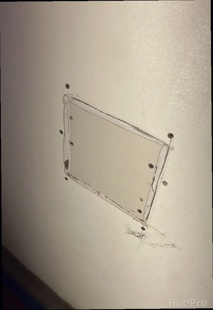 Professional drywall installers in Huntington Beach CA preparing drywall for paint