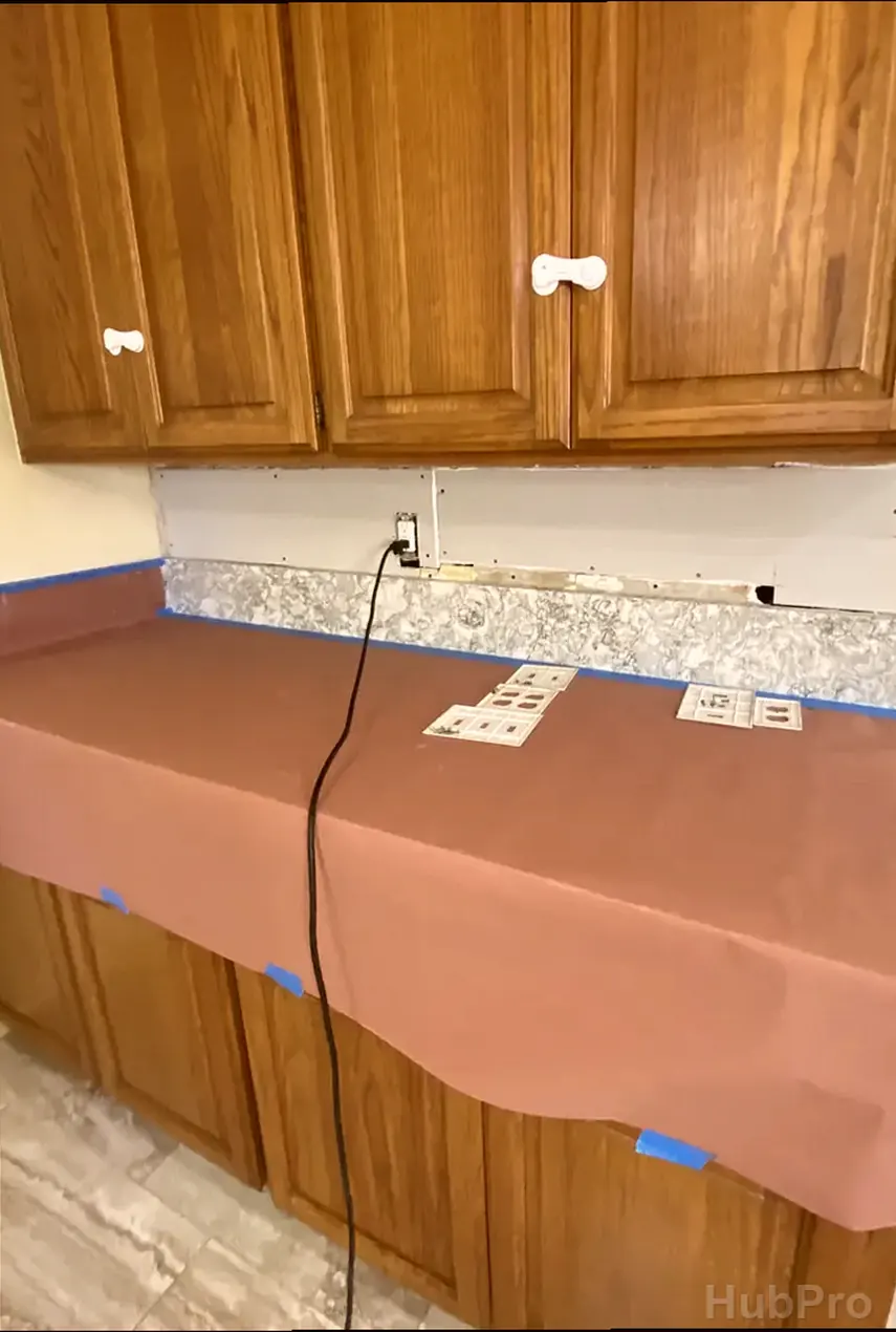 Professional drywall installers in Irvine CA preparing drywall for paint