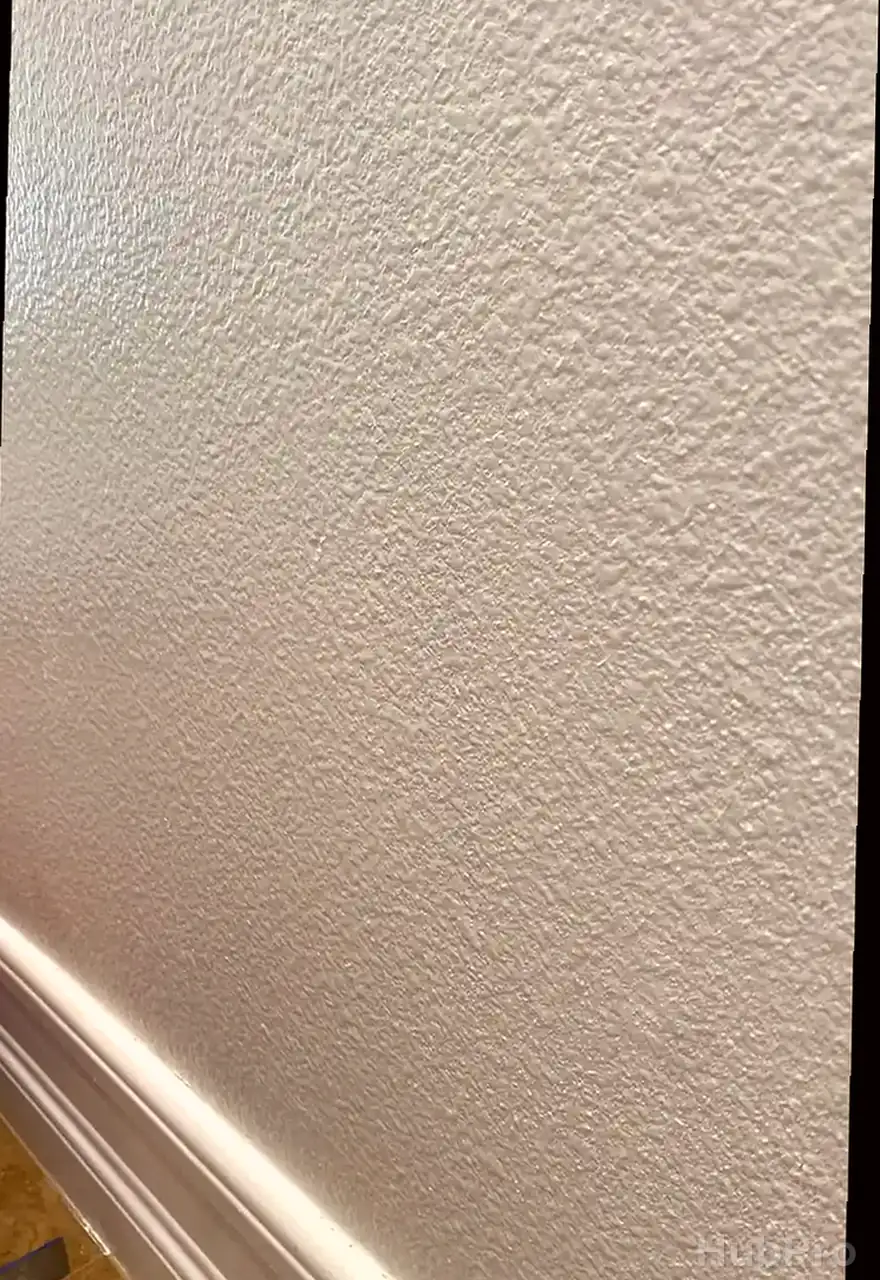 Professional drywall installers in Lake Forest CA preparing drywall for paint