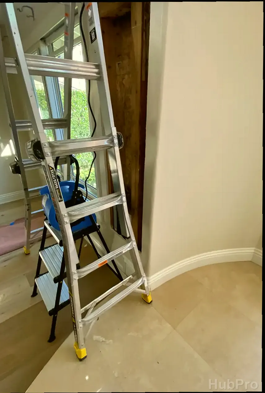 Professional drywall installers in Los Alamitos CA preparing drywall for paint