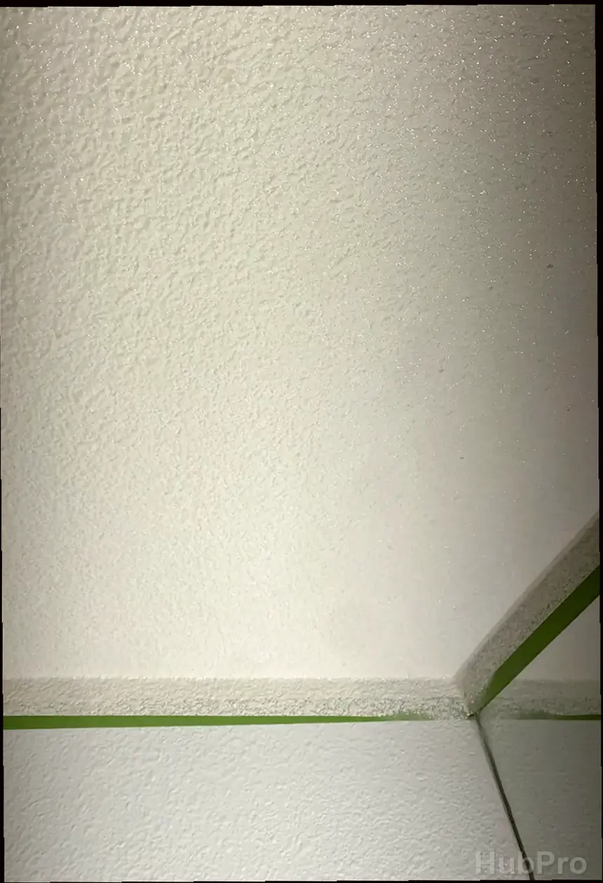Wall hole repair service in Newport Beach CA with texture matching and smooth finish