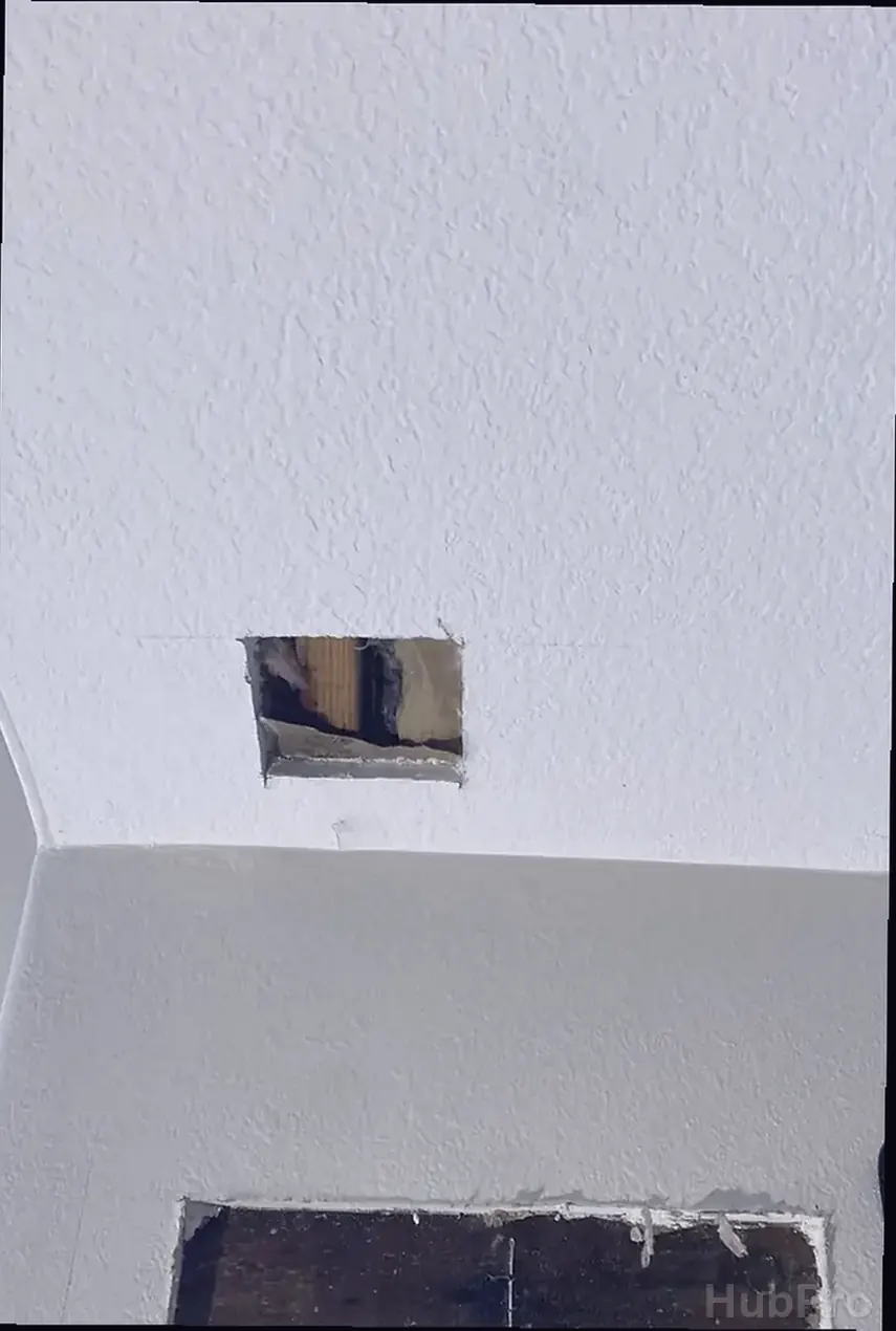 Professional drywall installers in Newport Beach CA preparing drywall for paint