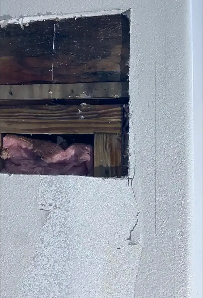Wall hole repair service in San Clemente CA with texture matching and smooth finish