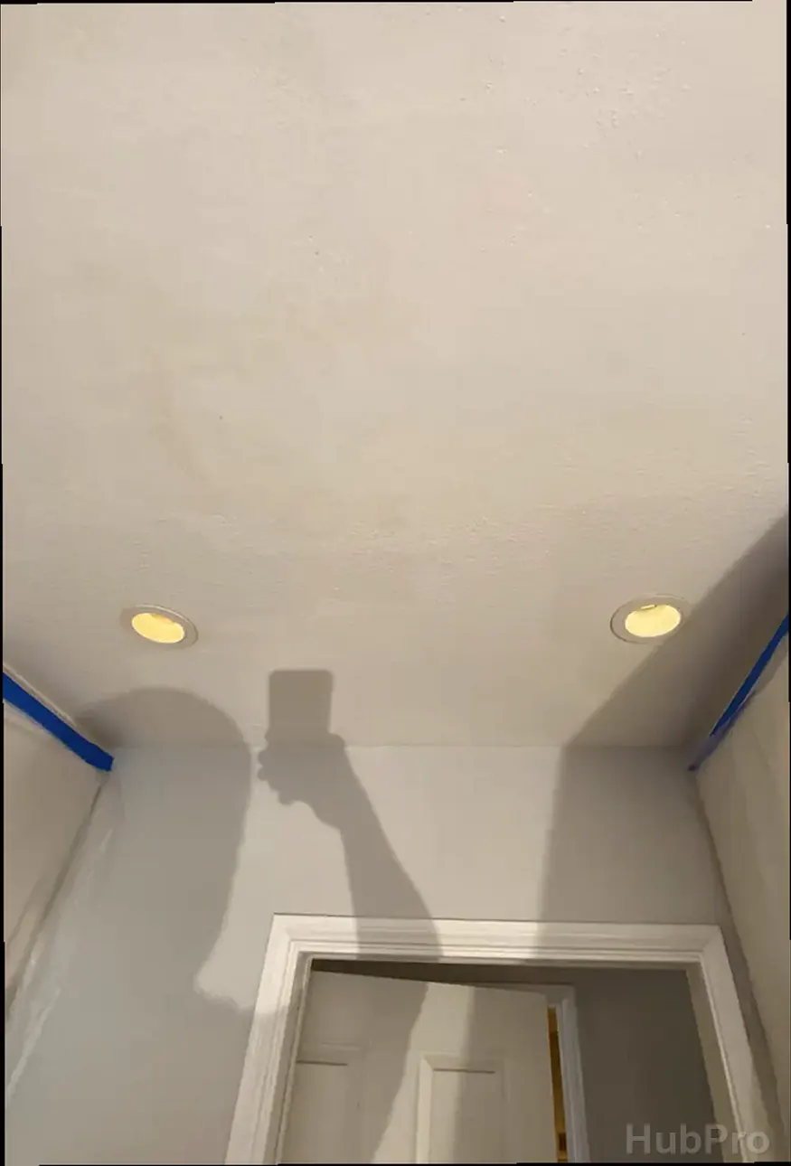 Wall hole repair service in San Juan Capistrano CA with texture matching and smooth finish