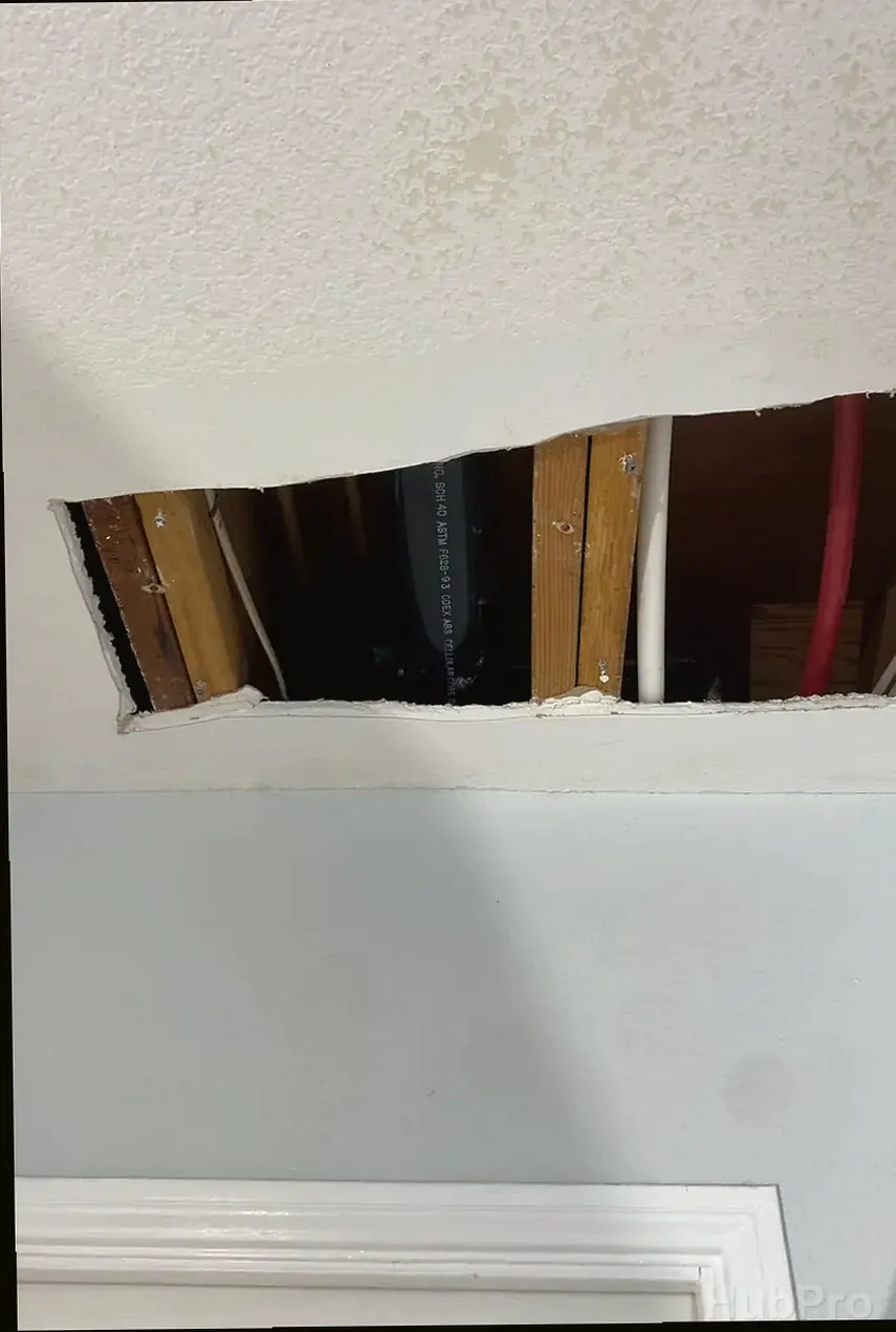 Professional drywall installers in Santa Ana CA preparing drywall for paint