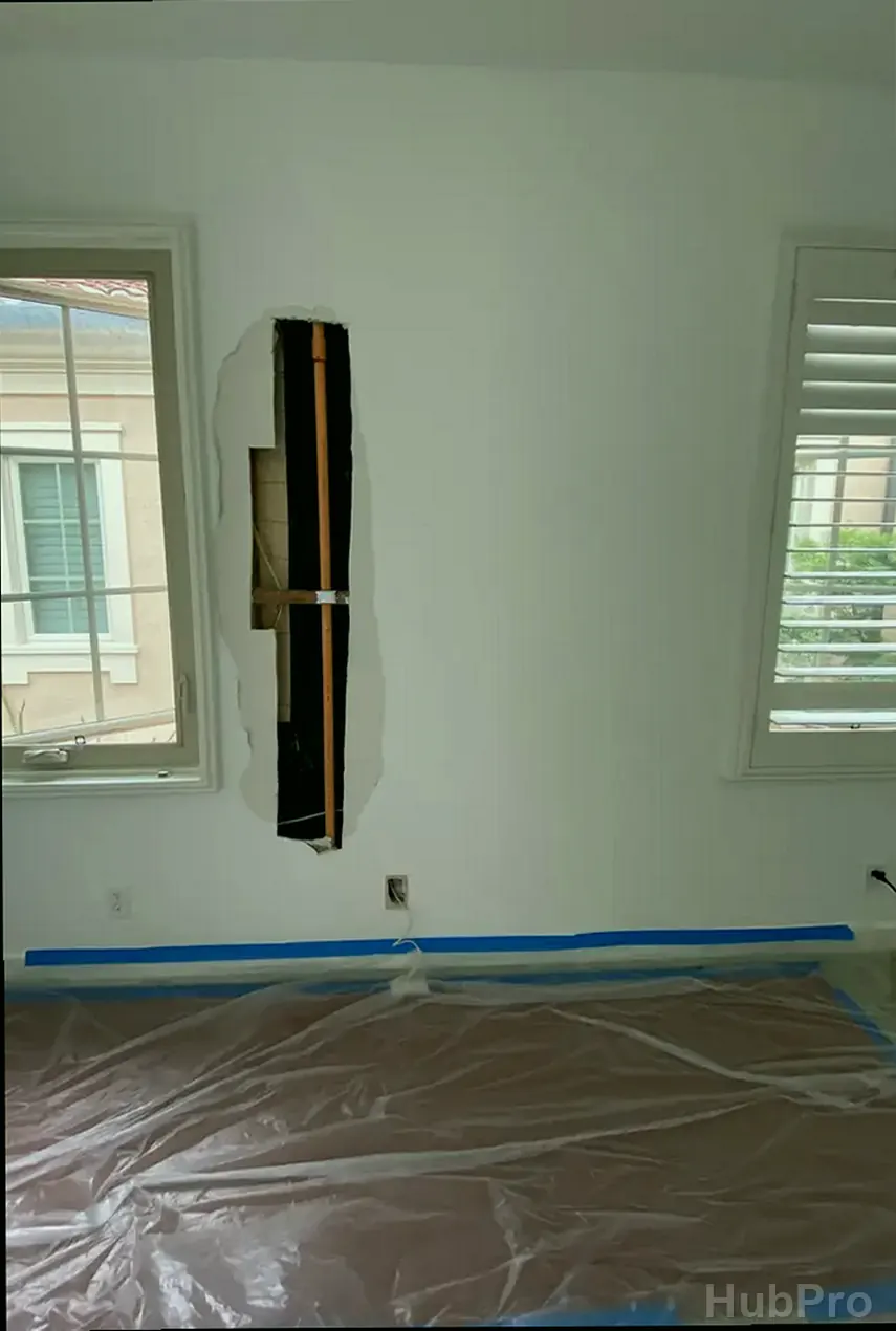 Professional drywall installers in Villa Park CA preparing drywall for paint
